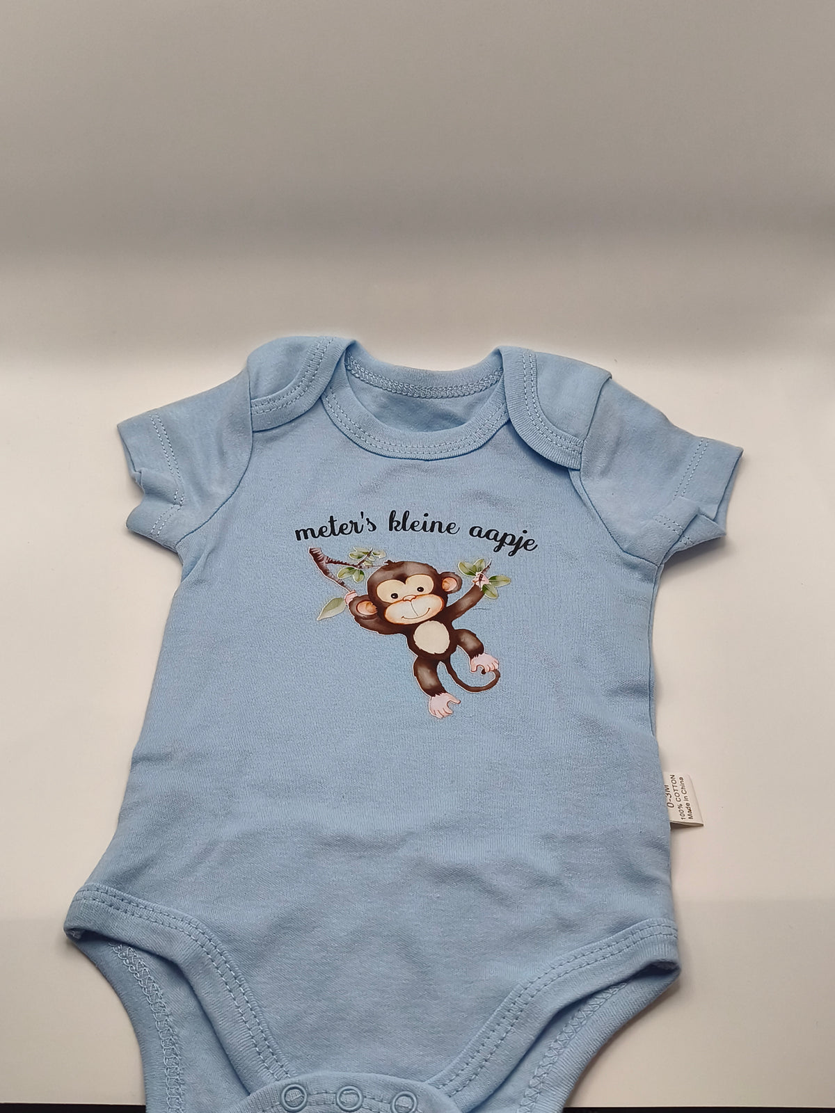 Baby body met dierenopdruk